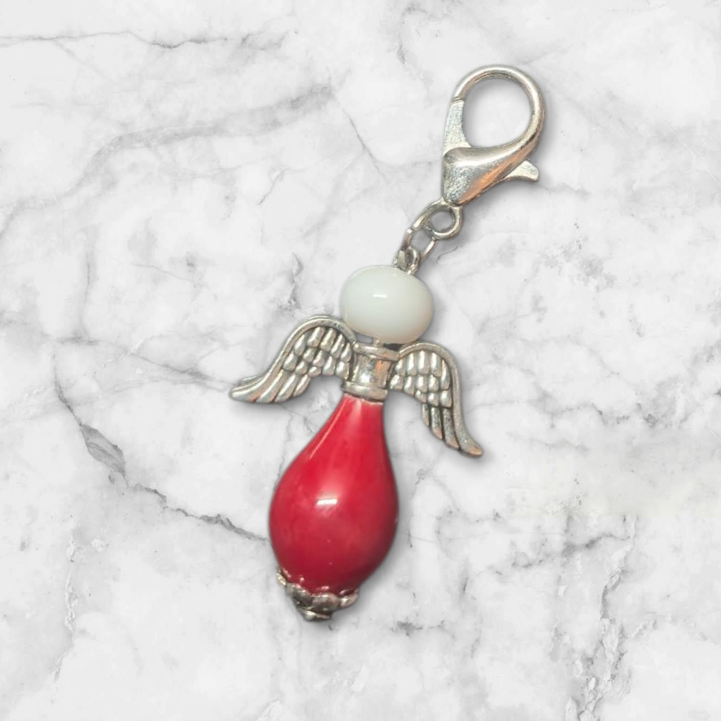 Engel Taschen- und Schlüsselanhänger.